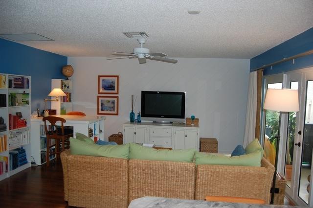 2899 Northwest 24th Court Boca Raton, FL 33431 - Photo 10 of 31 a living room with furniture and a flat screen tv