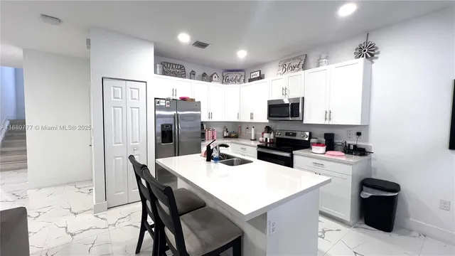 a view of a house with backyard of the house