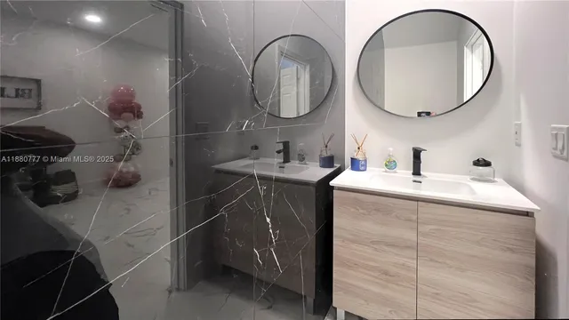 a bedroom that has a bed and a table in it