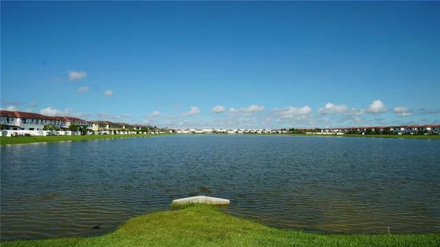 a view of a fountain in front of a house