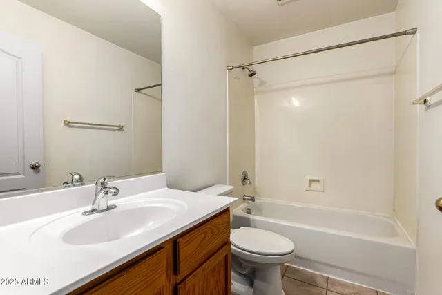 a view of a house with backyard and garden