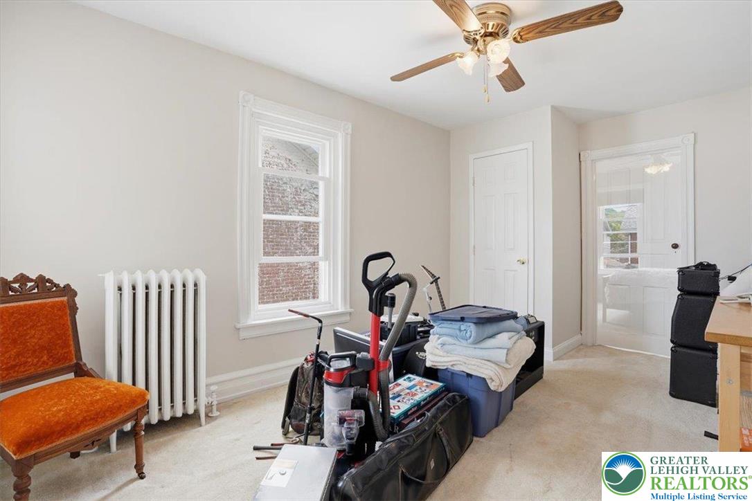 525 Ridge Street Emmaus, PA 18049 - Photo 35 of 68 This bright room features a window overlooking brick and a classic radiator for comfort.