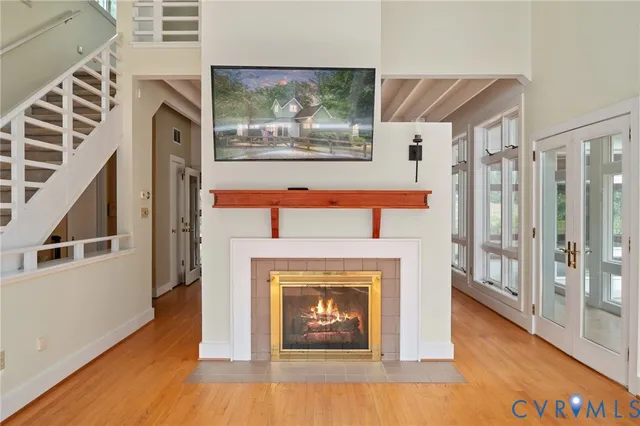 a view of an empty room with a balcony
