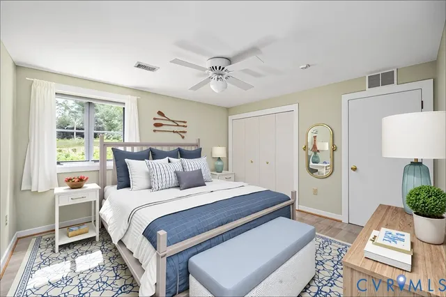 a view of a backyard with wooden fence