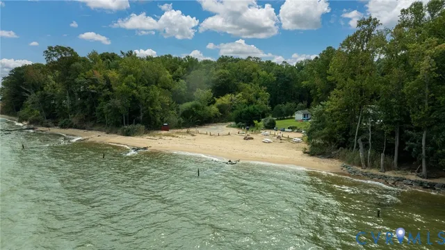 aerial view of a house with a yard