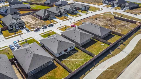 a view of a big yard with a big yard and large tree