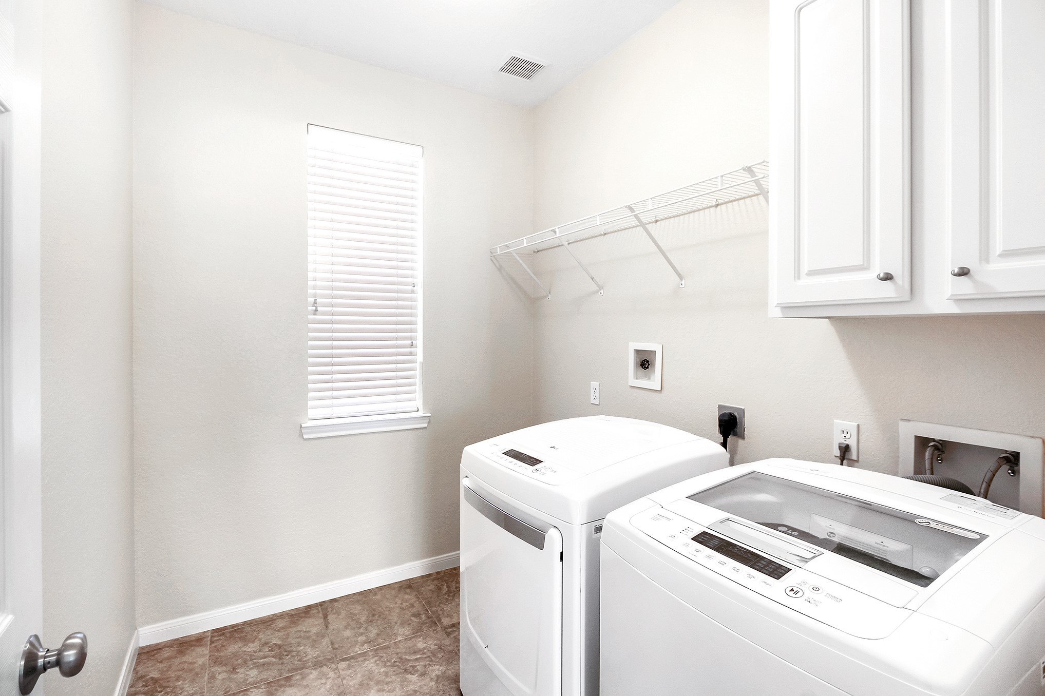 803 Chisel Point Drive Houston, TX 77094 - Photo 19 of 36 Utility room, washer and dryer are included.