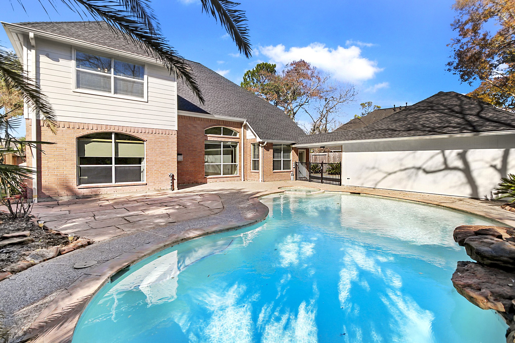 803 Chisel Point Drive Houston, TX 77094 - Photo 34 of 36 The backyard is perfect for entertaining, with plenty of space of outdoor seating and dining.