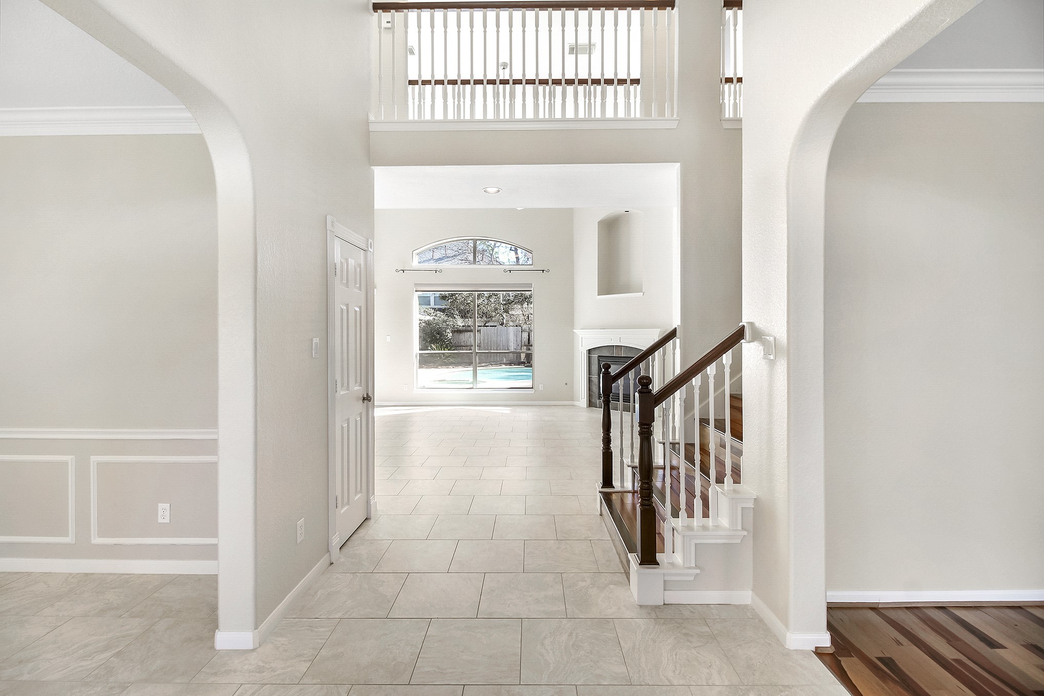 803 Chisel Point Drive Houston, TX 77094 - Photo 5 of 36 Double height ceilings in the entrance. To the right is the study and the formal dining is to the left.