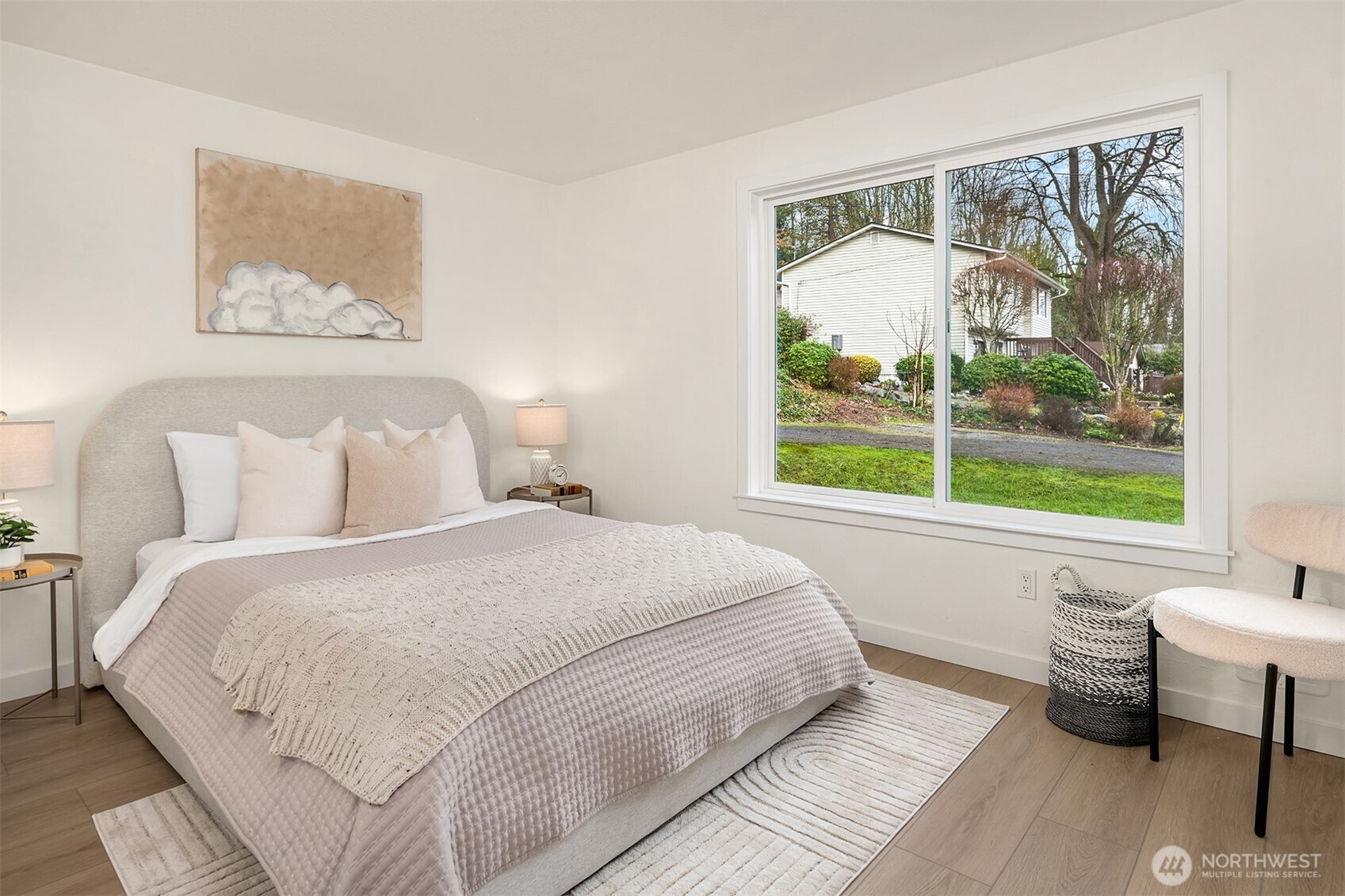 3105 South Hudson Street Seattle, WA 98108 - Photo 16 of 26 a bedroom with a bed and a large window
