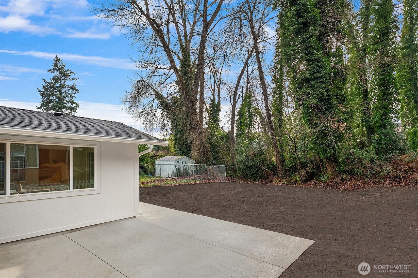 3105 South Hudson Street Seattle, WA 98108 - Photo 22 of 26 a view of a house with a tree