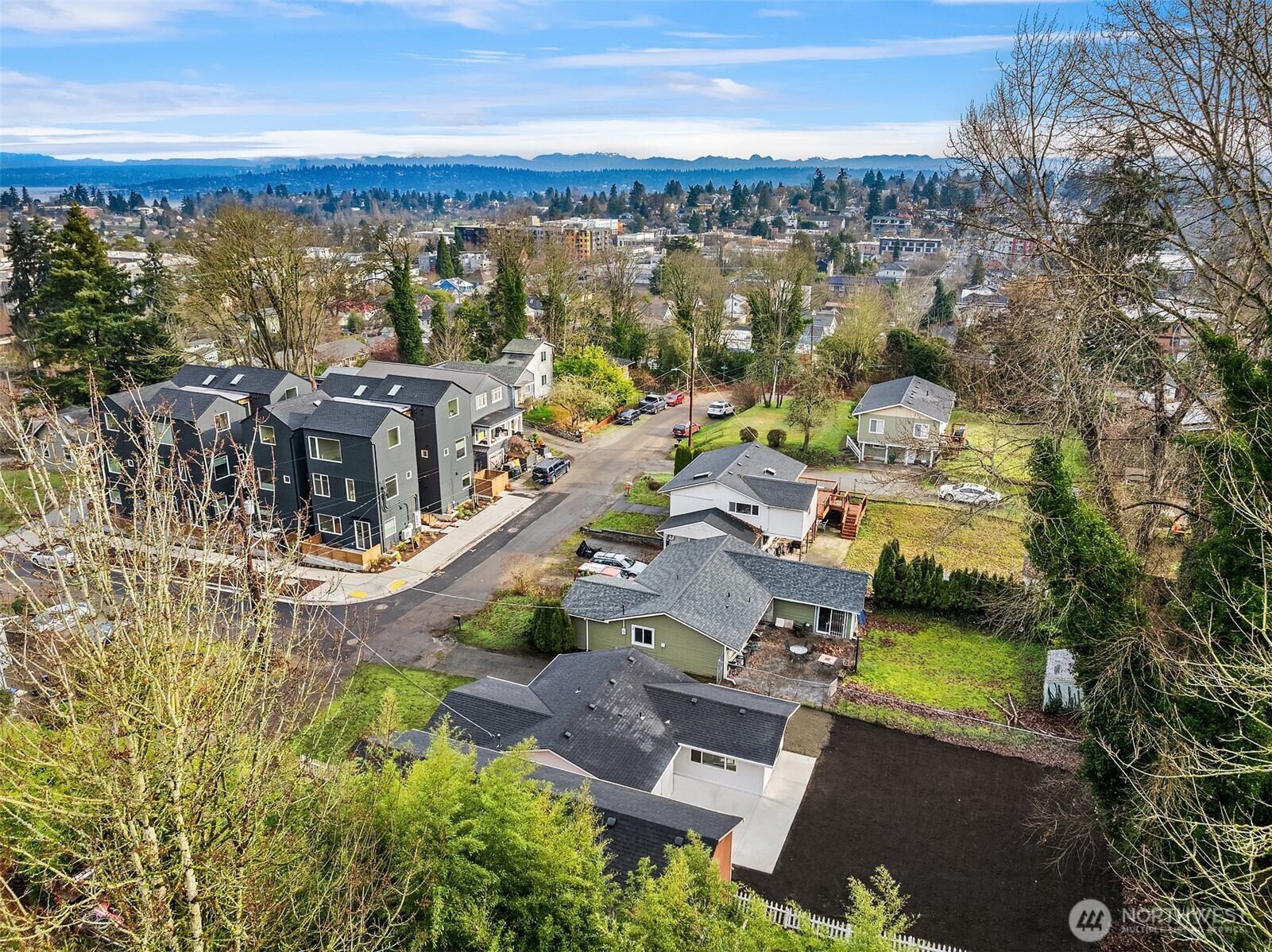 3105 South Hudson Street Seattle, WA 98108 - Photo 23 of 26 an aerial view of residential building and lake