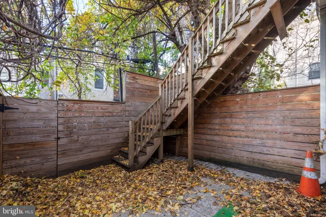 a view of a wooden door of a house