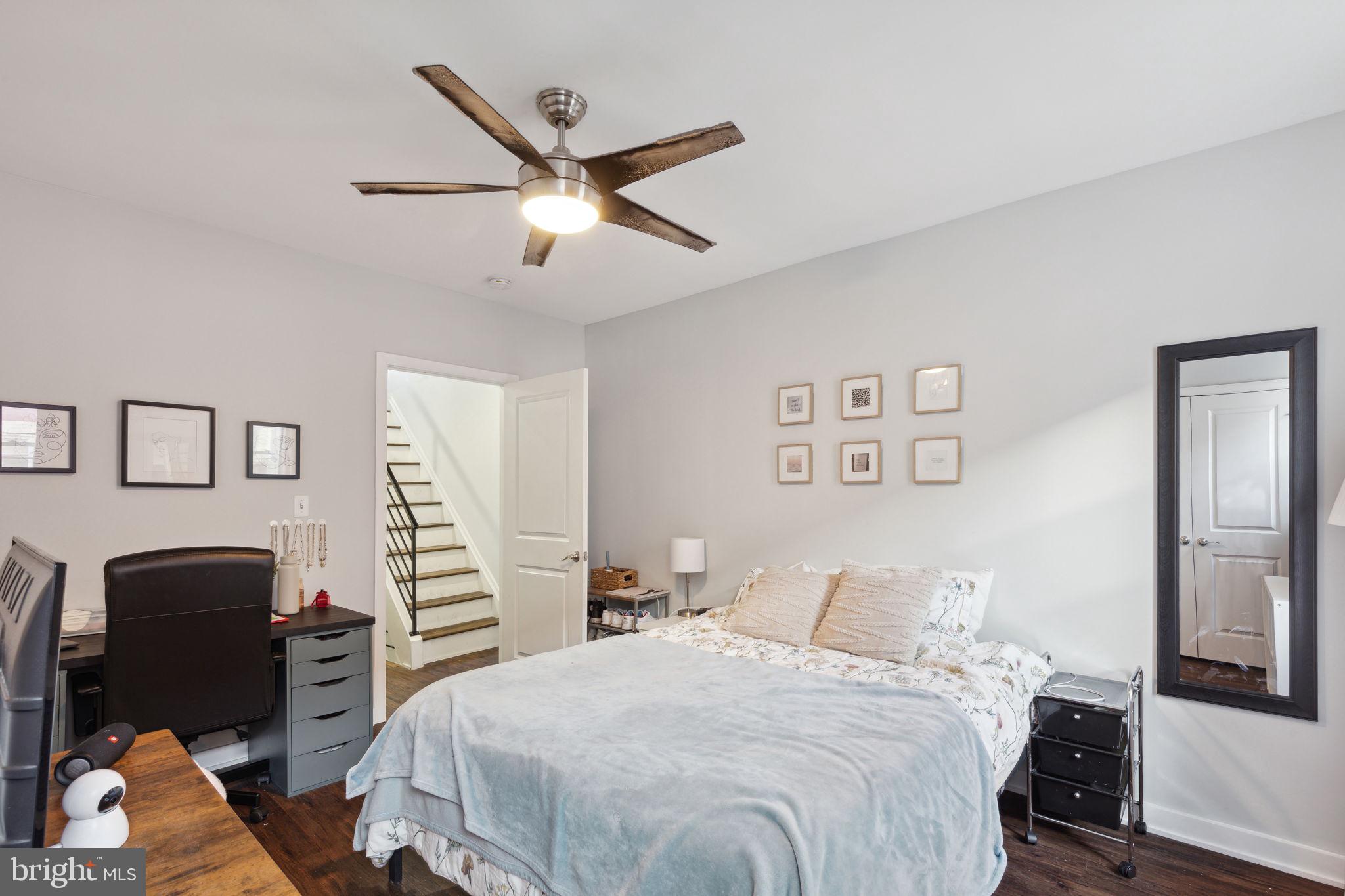 1715 Monument Street Philadelphia, PA 19121 - Photo 21 of 30 a bedroom with a bed and a dresser