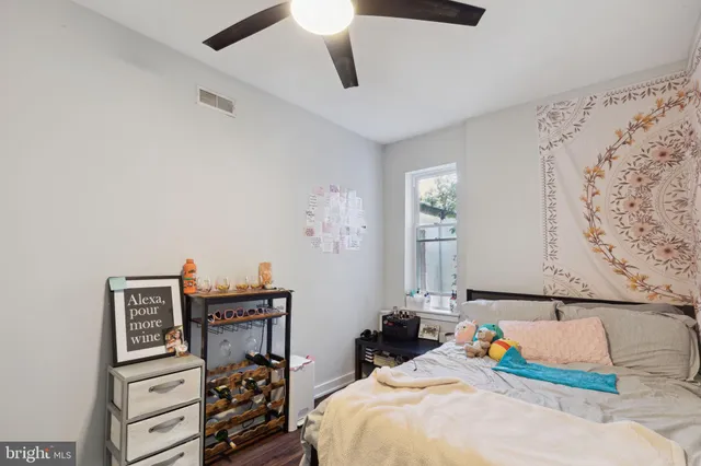 a bathroom with a sink a mirror and a toilet
