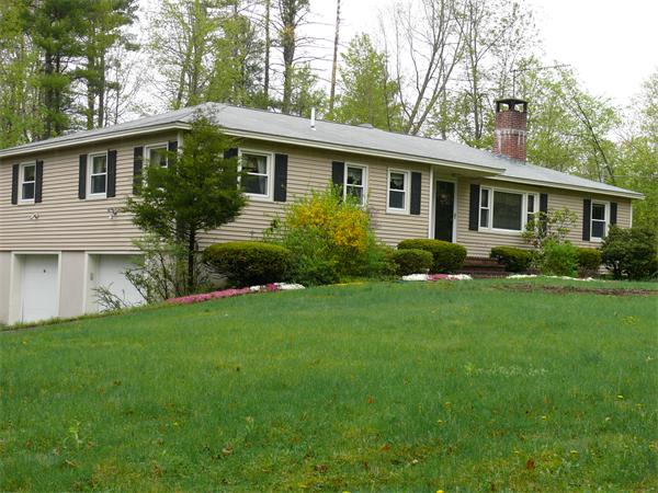 48 Horse Pond Road Shirley, MA 01464 - Photo 1 of 13 a view of a house with backyard and garden