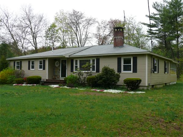 48 Horse Pond Road Shirley, MA 01464 - Photo 2 of 13 a view of an house with backyard space and garden