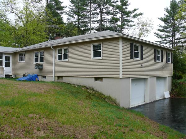 48 Horse Pond Road Shirley, MA 01464 - Photo 4 of 13 a view of a house with a yard