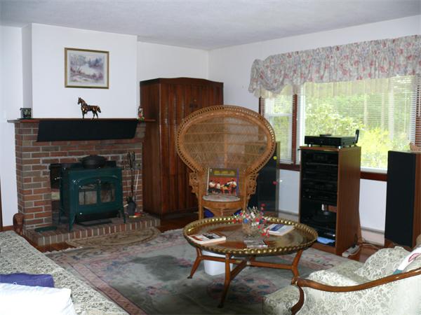48 Horse Pond Road Shirley, MA 01464 - Photo 6 of 13 a living room with furniture and a fireplace