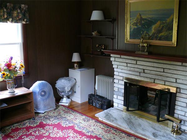 48 Horse Pond Road Shirley, MA 01464 - Photo 7 of 13 a living room with furniture a flat screen tv and a fireplace