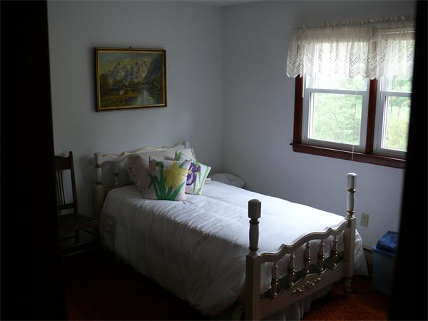 48 Horse Pond Road Shirley, MA 01464 - Photo 10 of 13 a living room with furniture and a window