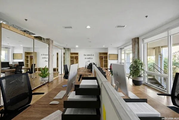 a view of a living room and dining room