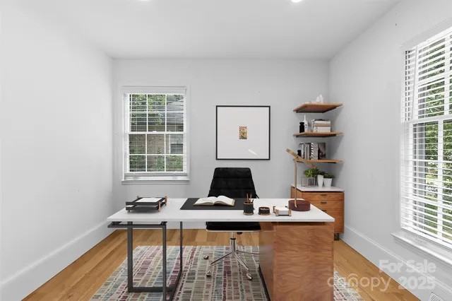 a living room with a couch and a window