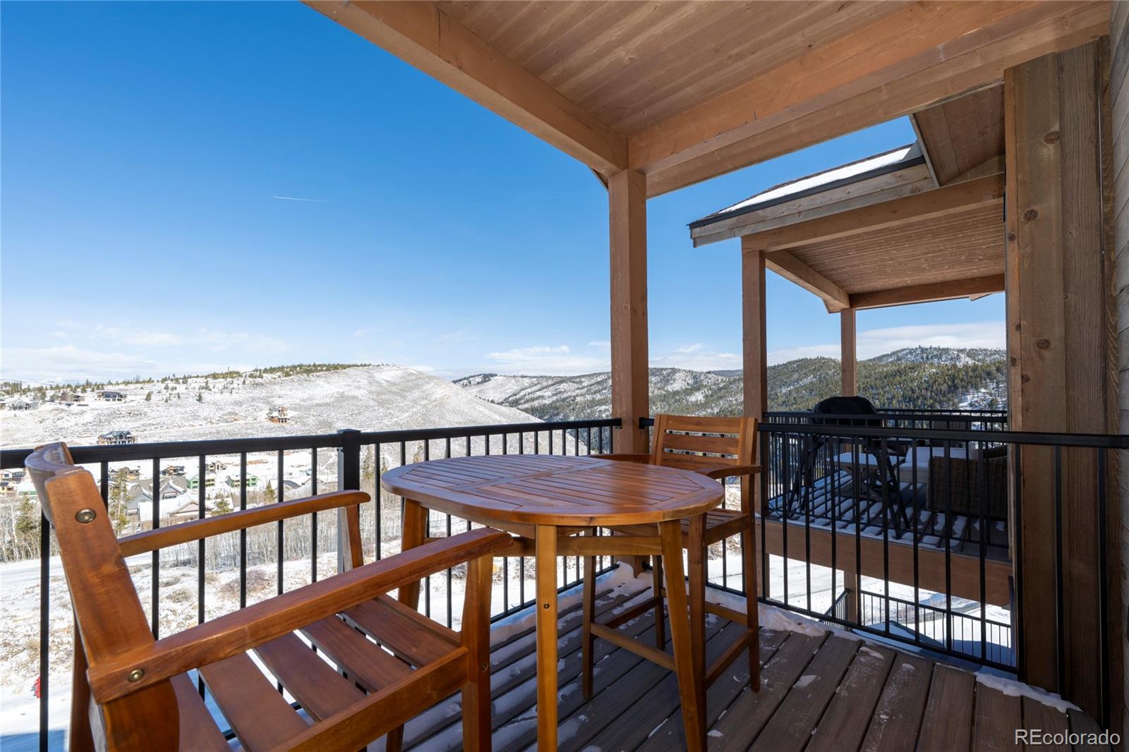 109 Saddle Mountain Camp Road Granby, CO 80446 - Photo 21 of 50 a view of a balcony with furniture and wooden floor