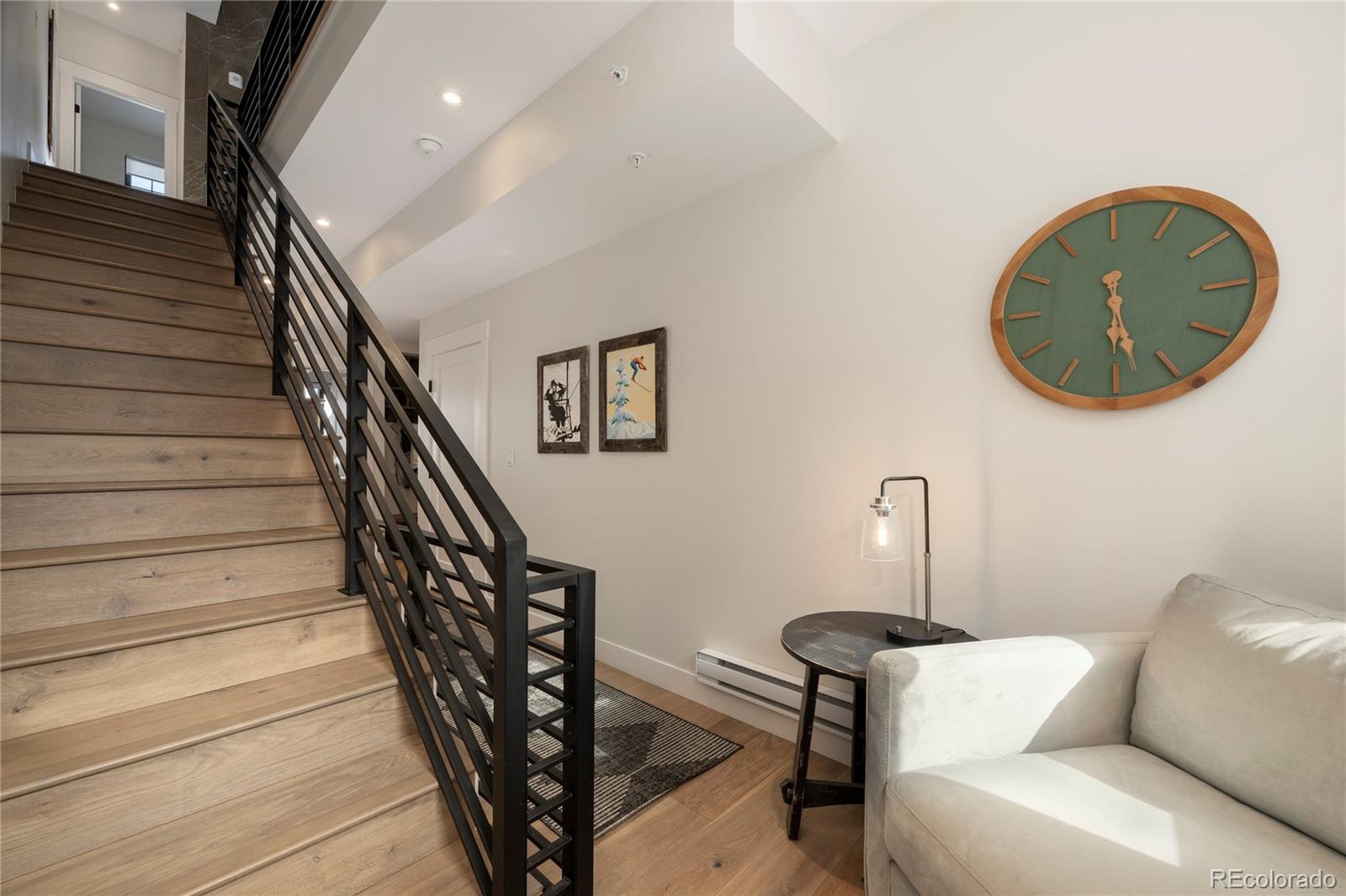 109 Saddle Mountain Camp Road Granby, CO 80446 - Photo 23 of 50 a living room with furniture and a wooden floor