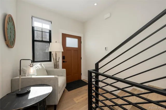 a bedroom with a bed and ceiling fan