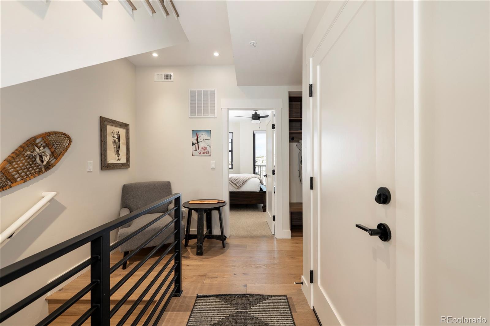 109 Saddle Mountain Camp Road Granby, CO 80446 - Photo 25 of 50 a hallway with furniture and a large window