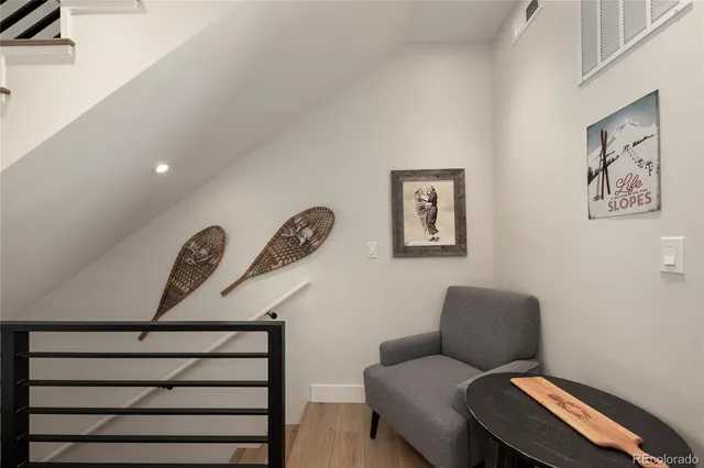 a view of a balcony with wooden floor