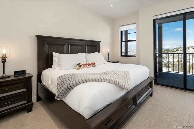 a bathroom with a shower sink and mirror