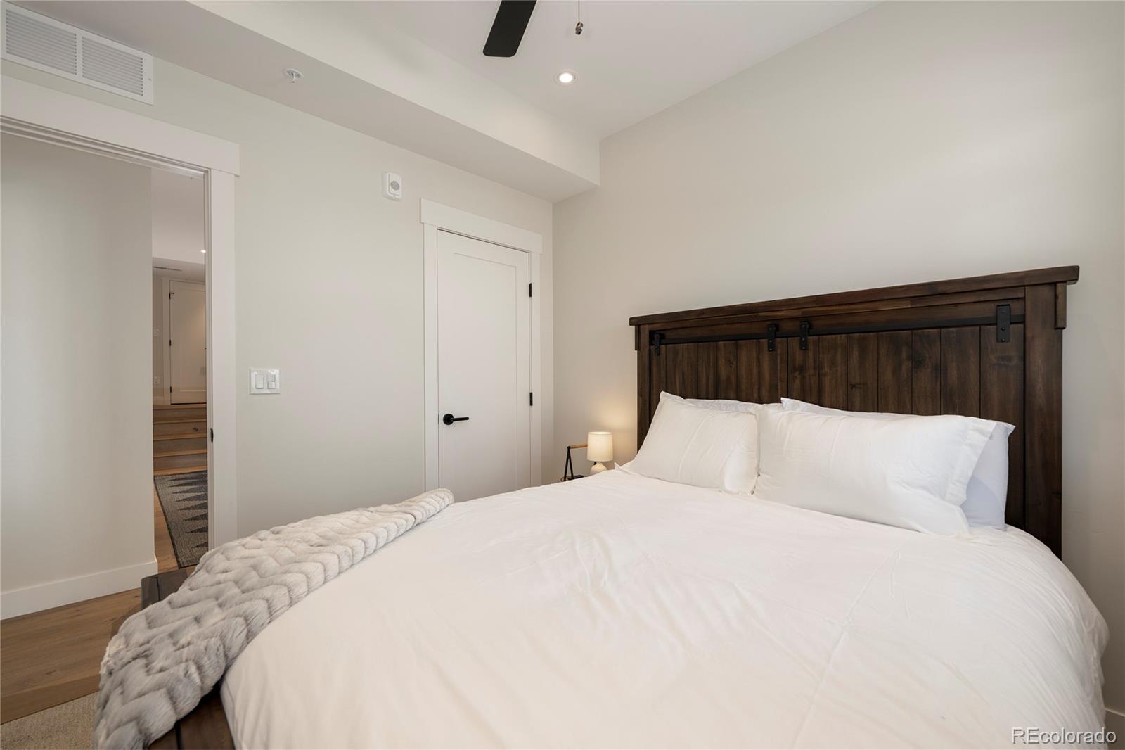 109 Saddle Mountain Camp Road Granby, CO 80446 - Photo 37 of 50 a bedroom with a bed and a closet