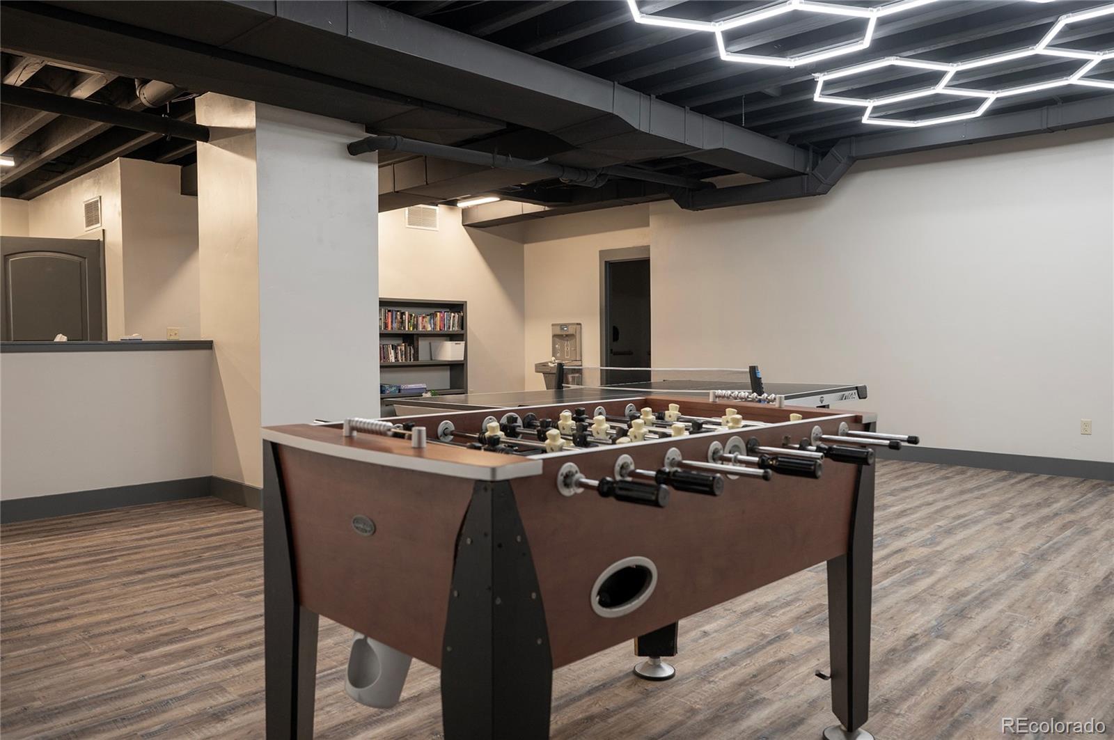 109 Saddle Mountain Camp Road Granby, CO 80446 - Photo 48 of 50 a view of a kitchen with appliances and wooden floor