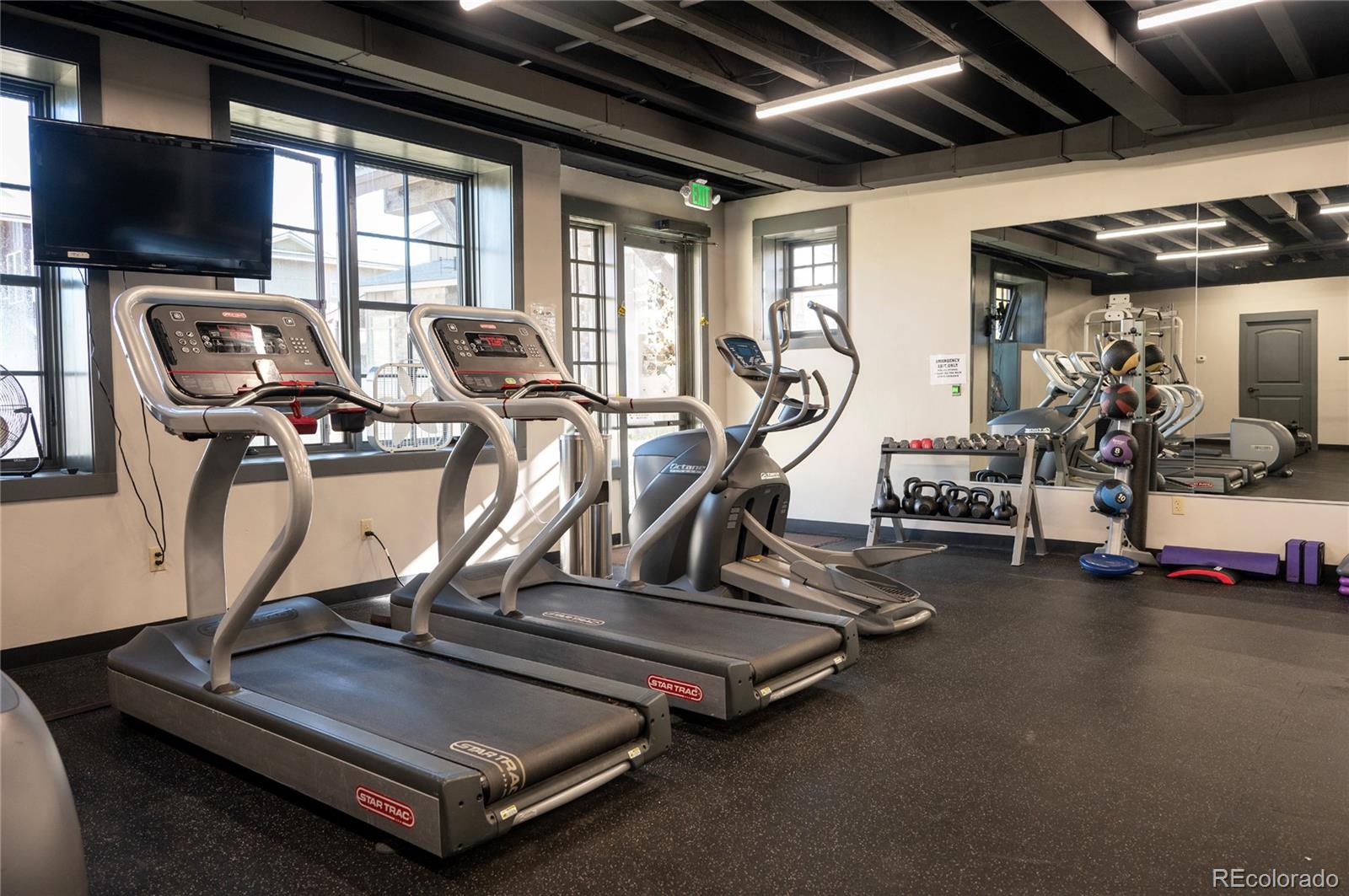 109 Saddle Mountain Camp Road Granby, CO 80446 - Photo 50 of 50 a room with gym equipment and windows