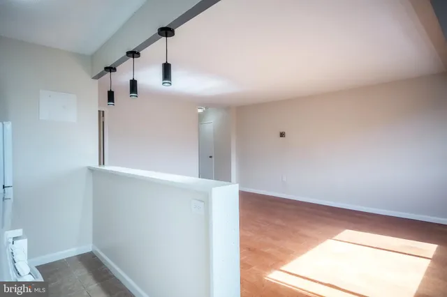 a view of a hallway with entryway