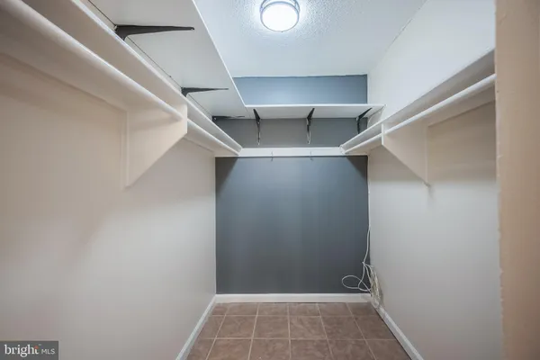 a view of an empty walk in closet