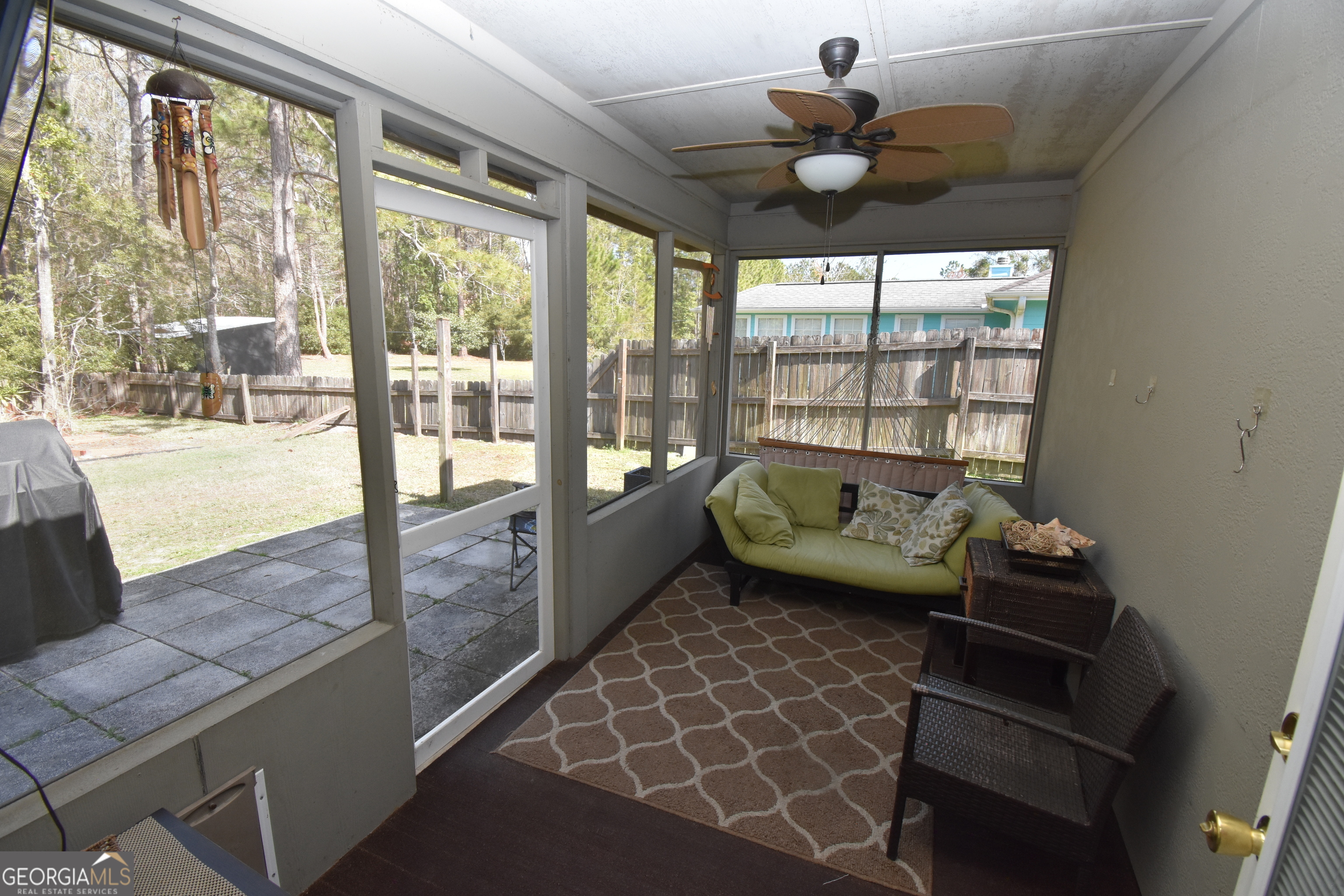 218 Lake Forest Drive Kingsland, GA 31548 - Photo 14 of 17 a living room with furniture and a large window