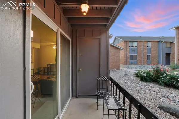 a view of a swimming pool with a lounge chairs