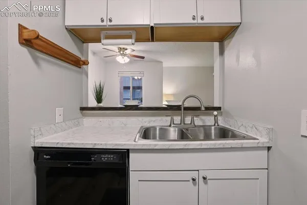 a bedroom with a bed and a desk