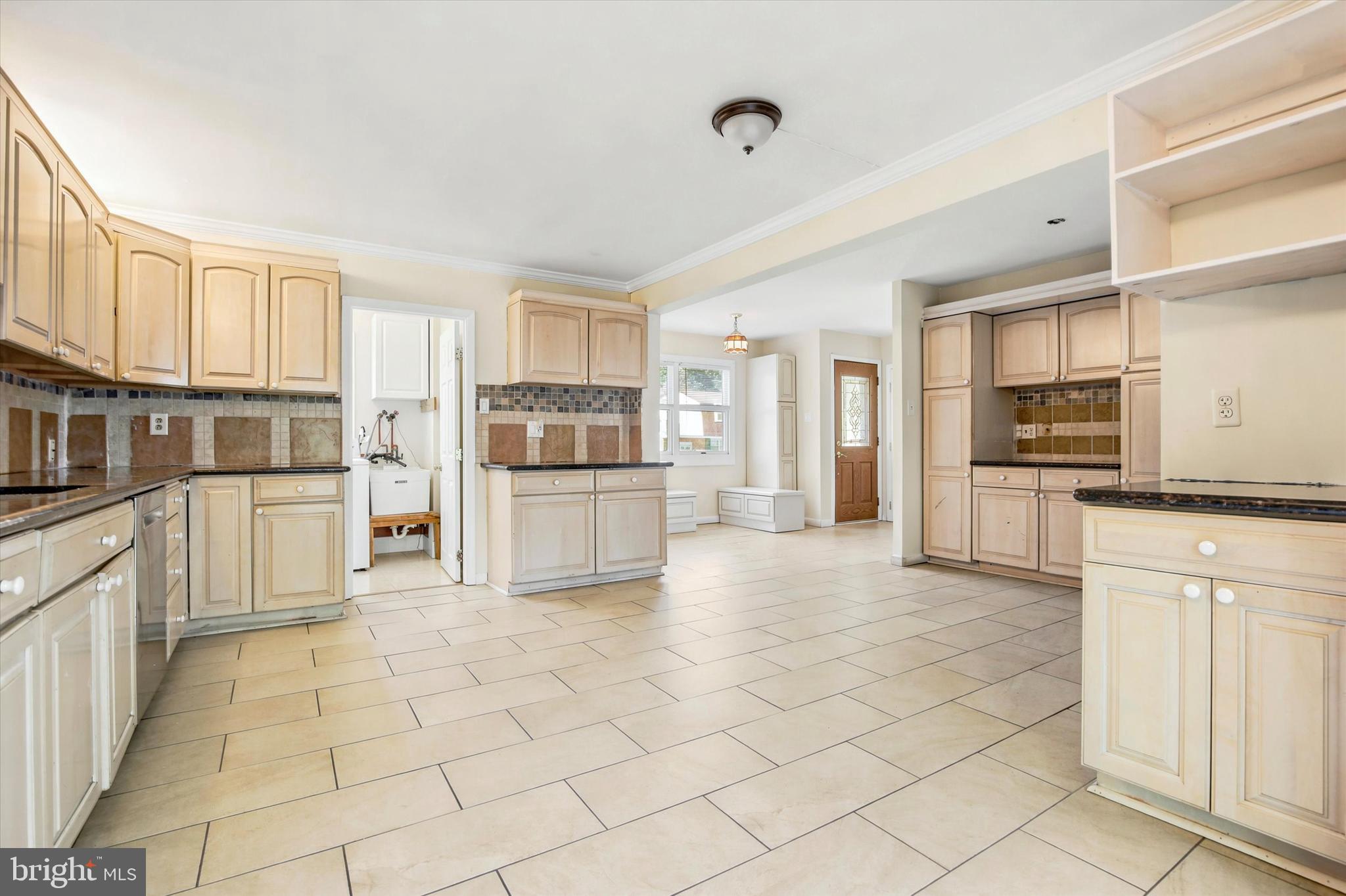 1167 Cushmore Road Southampton, PA 18966 - Photo 12 of 25 a kitchen with stainless steel appliances granite countertop a refrigerator and a stove top oven