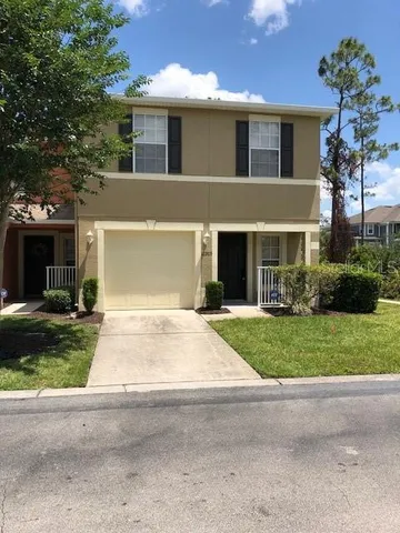 front view of a house and a yard