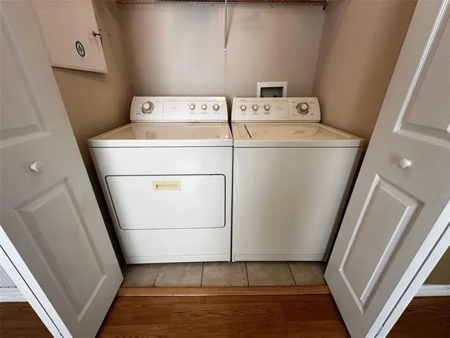 a utility room with dryer and washer