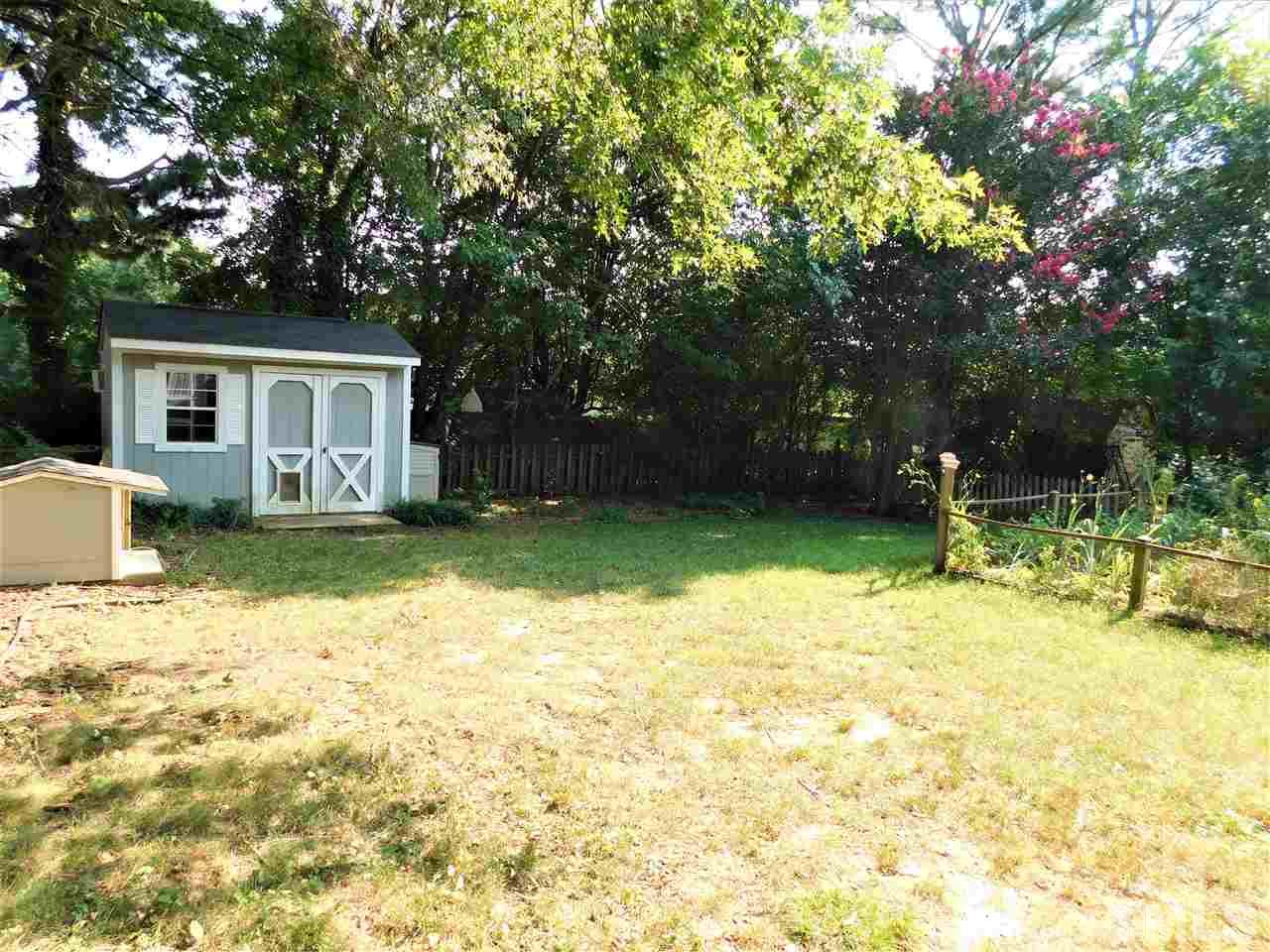 3917 Iron Horse Road Raleigh, NC 27616 - Photo 8 of 19 a backyard of a house with yard and trampoline