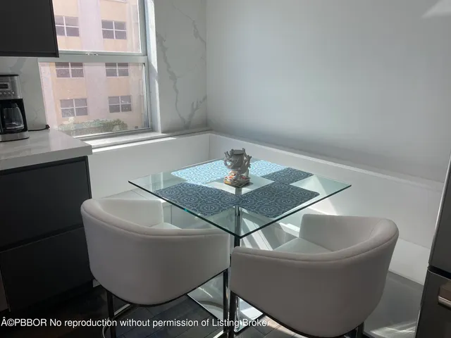 a white bath tub sitting in a bathroom