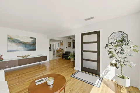 a view of a living room and a window