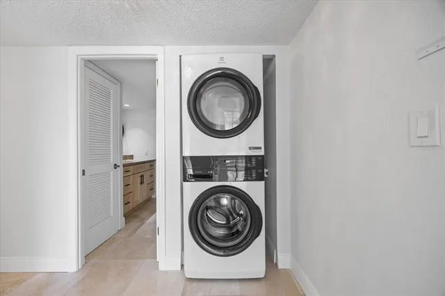 a view of a washer and dryer in a utility room