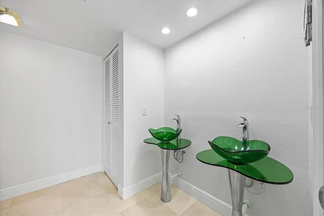 a vase with flowers sitting on a table