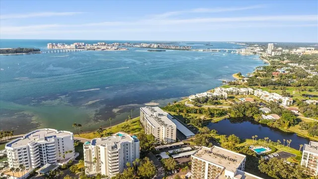 a view of city with ocean